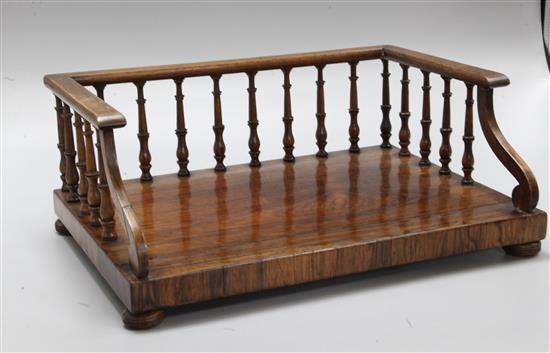 A George IV rosewood book tray with three-quarter spindle gallery
